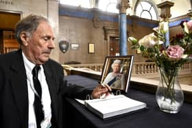 Mayor Alan Dowson with the book of condolence