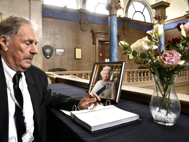 Mayor Alan Dowson with the book of condolence