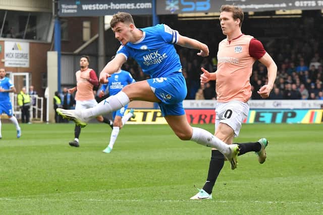Harrison Burrows shoots at goal for Posh v Pompey. Photo David Lowndes.