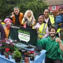 Cllr Heather Skibsted and volunteers from Up the Garden bath planting five recycled baths  at a community area at Lythmere, Orton Malbourne, Peterborough.