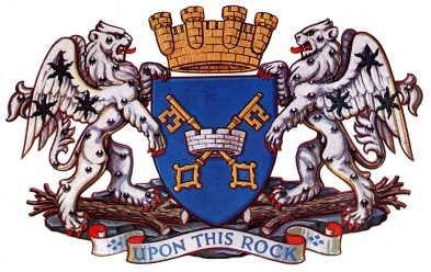 The city of Peterborough is named after Saint Peter and the coat of arms heavily reflects this. 
Notice the motto on the coat of arms. In the bible, when the Pharisees were asking Jesus to prove who he was by giving them a sign from heaven, he was recognised by Peter as "the Christ, the son of the living God." In response, Jesus said: "UPON THIS ROCK I will build my church and the gates of hell shall not prevail against it." He also entrusted Peter with the keys to the Kingdom of Heaven, hence the cross keys-recognisable throughout the city.