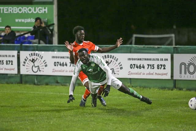 Der8ick Dadzie in action for FC Peterborough v Yaxley.