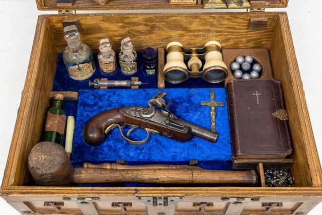 The Victorian-style kit, housed in a wooden box adorned with crosses and a crucifix, includes a dagger, pistol, stakes to drive through the creature’s heart, a 19th century Book of Common Prayer and a bottle labelled ‘Holy Water’.