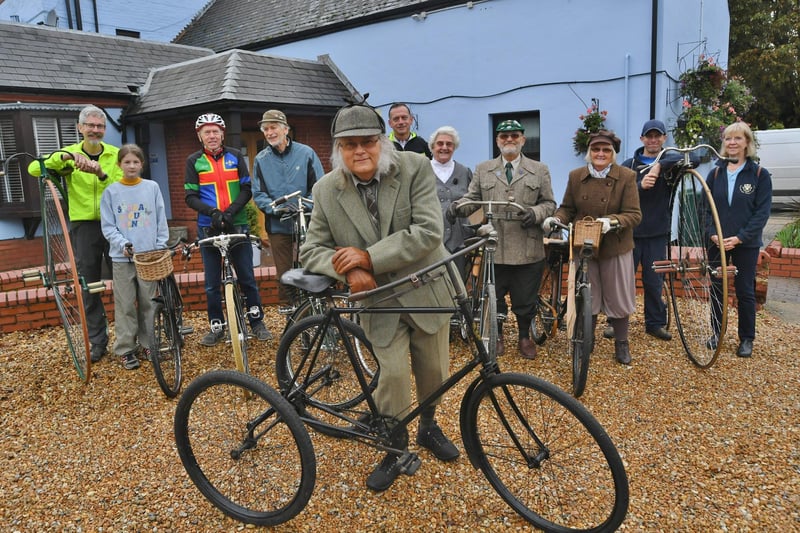 Tricycle rider Stuart Lindsey with some of his fellow members from the Peterborough Vintage Cycle Club.