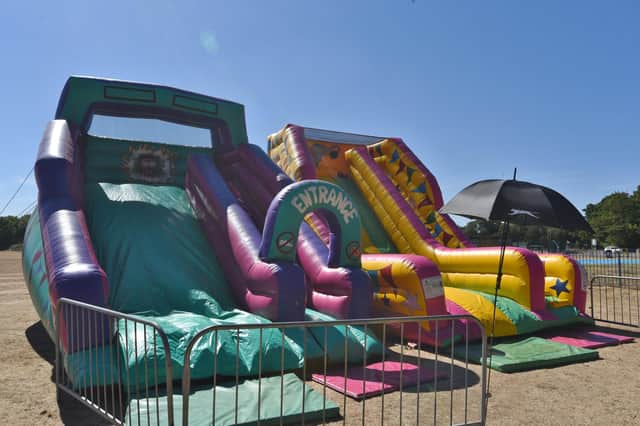 The inflatable slides provided by the council at Bretton Park.