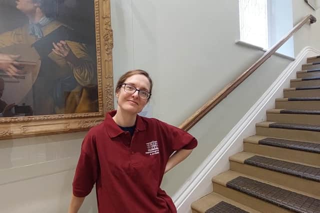 Laura Hancock, the museum’s heritage engagement manager, by the stairs favoured by the landmark's most famous ghost.