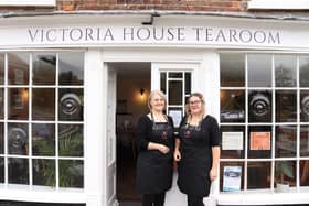 From left, Owner Sapphira Waterson with Jade outside the Victoria House Tearoom.