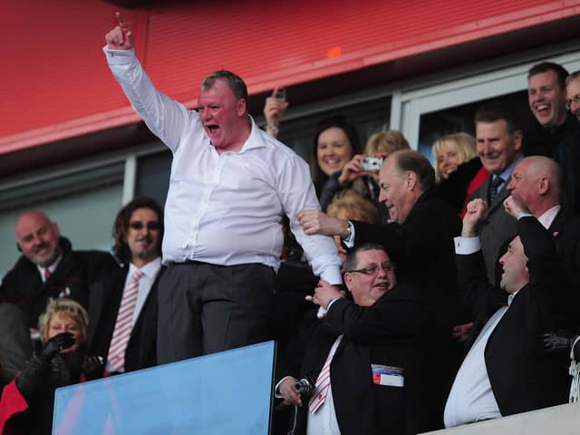 Steve Evans celebrates promotion from League Two with Rotherham in April, 2013. (Photo by Jamie McDonald/Getty Images)