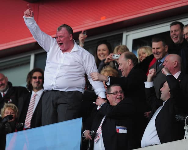 Steve Evans celebrates promotion from League Two with Rotherham in April, 2013. (Photo by Jamie McDonald/Getty Images)