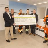 B&amp;DWC - 8554 - Daivd and Harris from David Wilson Homes presenting Magpas with their cheque