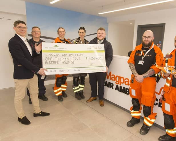 B&amp;DWC - 8554 - Daivd and Harris from David Wilson Homes presenting Magpas with their cheque