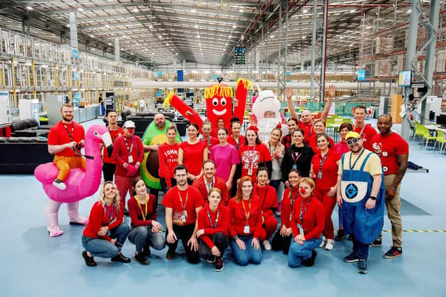 The staff at Amazon in Peterborough who have raised more than £1,000 for Comic Relief.