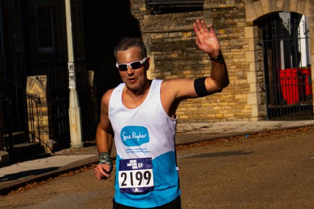 Richard Ostler in the Cathedral grounds. He was raising money in memory of his dad who was cared for at Sue Ryder Thorpe Hall Hospice. Photo: Paul Robinson