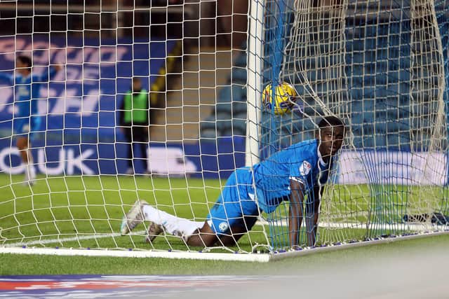 Kwame Poku and the ball are in the back of the Burton net as Posh score a fourth goal. Photo: Joe Dent/theposh.com.