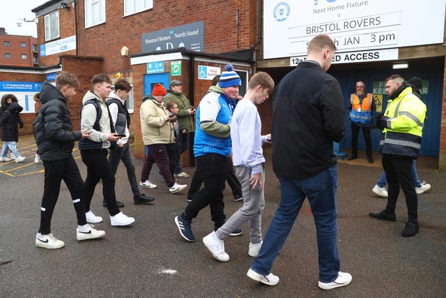 Fans make their way into the Weston Homes Stadium for the FA Cup clash with Bristol Rovers on January 08, 2022.