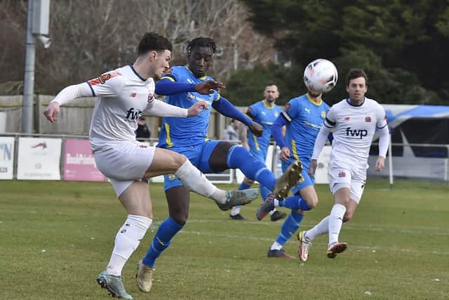 Maniche Sani (blue) in action for Peterborough Sports against Fylde. Photo: David Lowndes.
