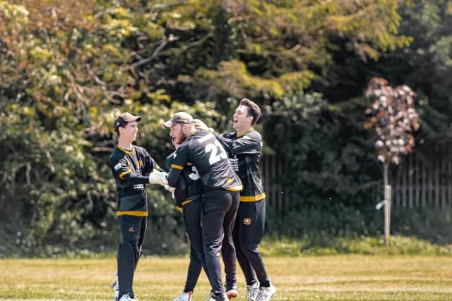 Ramsey CC celebrate a wicket against Eaton Socon. Photo: Sean Hill Photography