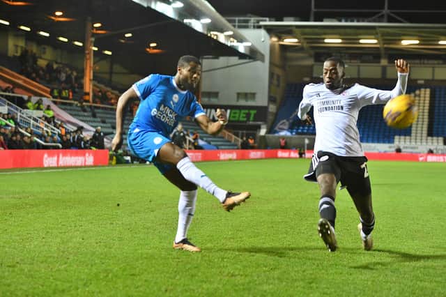 David Ajiboye crosses the ball against Crawley. Photo: Joe Dent.