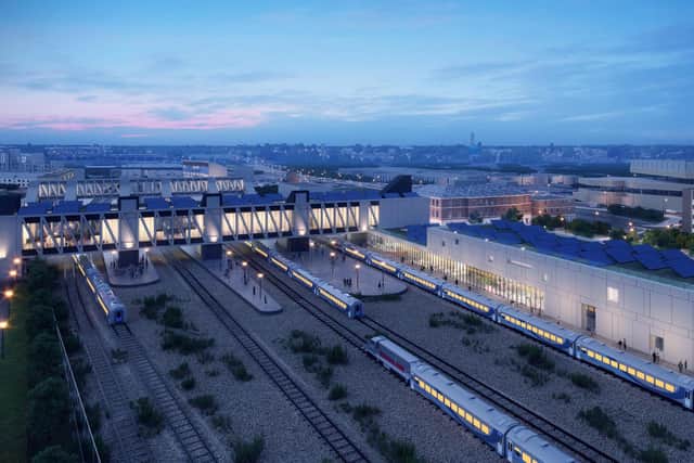This image shows the vision for a new look train station for Peterborough with new footbridge across the tracks.