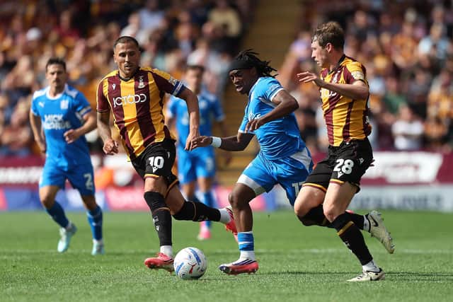 Vernon Masara is in action for Peterborough United against Bradford City. Photo: Joe Dent.