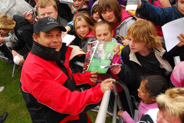 Celebrity guest Craig Charles - famed for Red Dwarf and Robot Wars - mingles with the crowd and signs autographs at the Mercedes stand at Truckfest 2009.