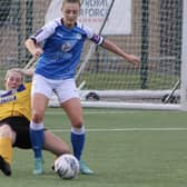 Keir Perkins in action for Posh Women