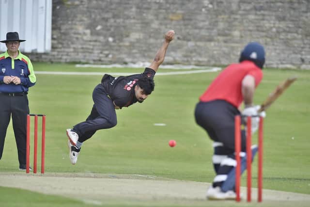 Mohammed Danyaal bowling for Brigstock at Oundle Town. Photo: David Lowndes.
