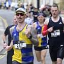 Runners in the Burghley 7 mile race going through Stamford town centre. Photo David Lowndes.