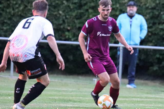 Zam Munton in action for Bourne against Wisbech Town. Photo: Dave Mears