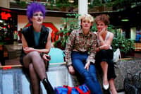 Three youngsters sitting inside Queensgate shortly after it opened