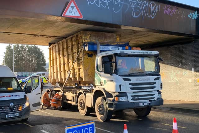 The lorry is stuck under the bridge at Celta Road