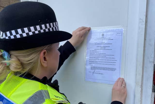 Police put up official closure notice at 77 Wharf Road, Woodston, Peterborough