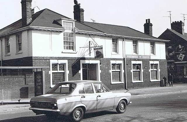 The (Old) Locomotive pub on Lincoln road, New England in the 1970s. Both the bus stop and the building remain, although the latter is now home to a solicitors and a Portuguese restaurant.

Bonus points if you can remember the make of the car (image: Peterborough Images Archive)