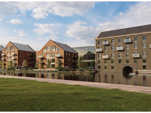 This image shows how the former Whitworth Mill at Fletton Quays, Peterborough, could be transformed into apartments. Three new blocks of flats would also be built nearby.