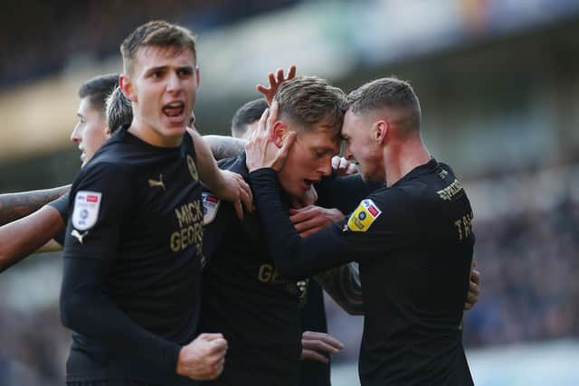 Posh players celebrate Frankie Kent's goal. Photo: Joe Dent/theposh.com.