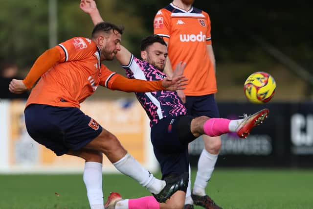 Action from Stratford Town (orange) v Peterborough Sports. Photo Darren Wiles