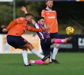 Action from Stratford Town (orange) v Peterborough Sports. Photo Darren Wiles