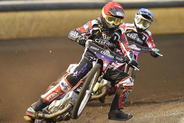 Speedway action from Peterborough Panthers v Belle Vue Aces at Alwalton pictured heat 6 featuring Michael Palm Toft (left) Scott Nicholls (right).