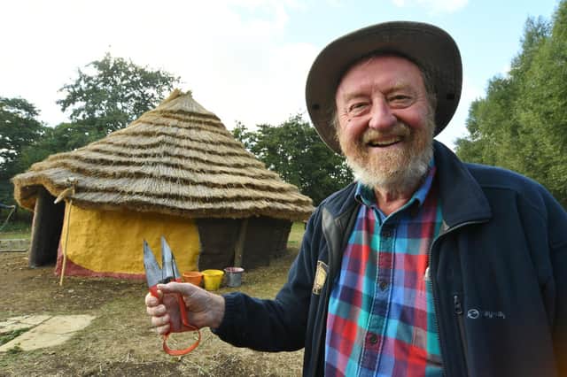 Francis Pryor at the  topping out of the new Iron Age roundhouse at Flag Fen