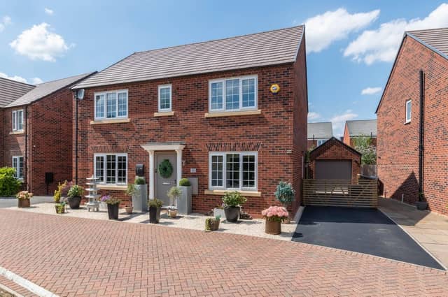 The property is positioned in a private drive