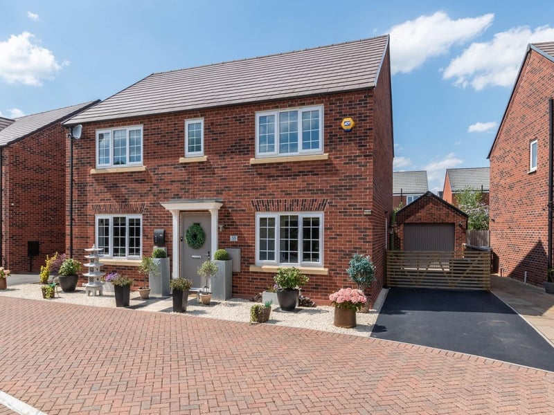 The property is positioned in a private drive
