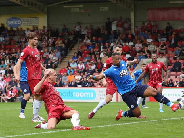 Jonson Clarke-Harris of Peterborough United scores the winning goal at Cheltenham. Photo: Joe Dent/theposh.com
