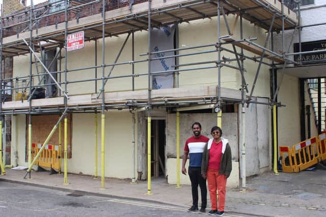 Rama Ragupathy and Kamala Alagappan (Foster) outside the March Market Place property they're develop