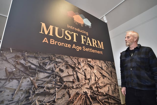 Must Farm exhibition at Peterborough Museum. Mark Knight from Cambridge Archaeological
