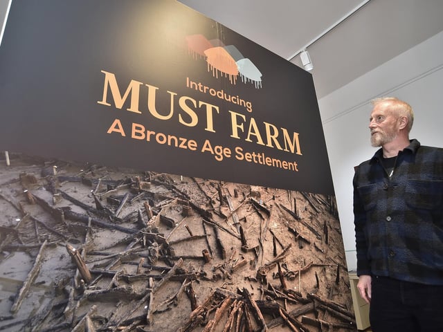 Must Farm exhibition at Peterborough Museum. Mark Knight from Cambridge Archaeological