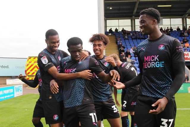 Kwame Poku celebrates his second goal for Posh at Shrewsbury. Photo: Joe Dent/theposhcom.
