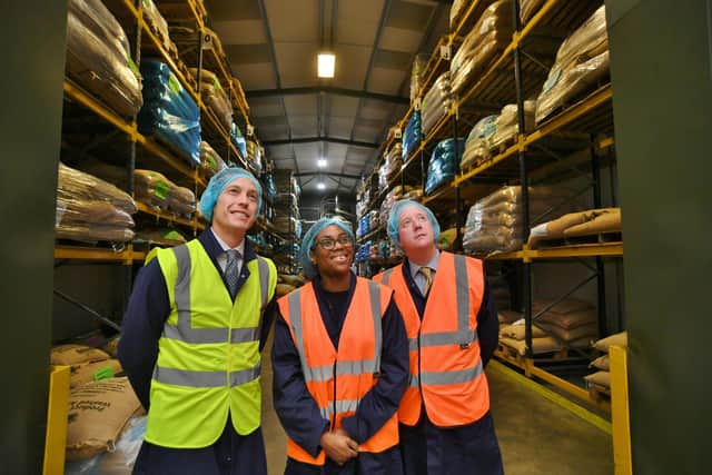 Secretary of State for Business and Trade Kemi Badenoch visiting the Masteroast coffee company at Fengate with commercial director Matthew Mills, left, and Peterborough MP Paul Bristow, right.