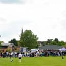 Past and present pupils, staff and families gathered on the school's Cheatle Field to celebrate