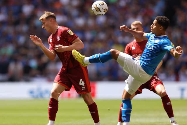 Owen Moxon (left) in action in the League Two play-off final against Stockport County. (Photo by Paul Harding/Getty Images)