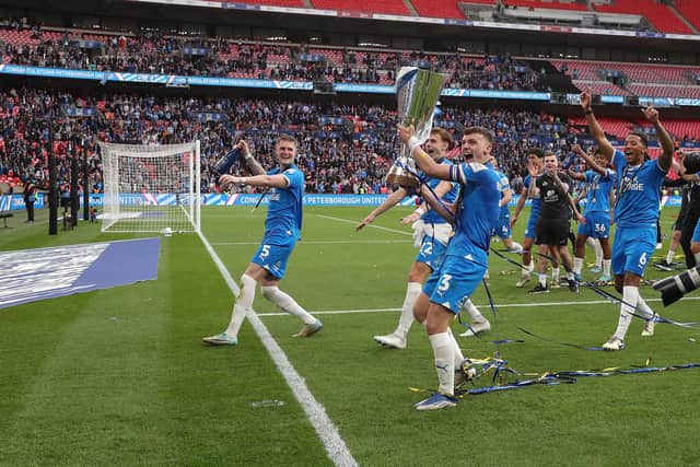 Peterborough United celebrate their victory. Photo: David Lowndes.